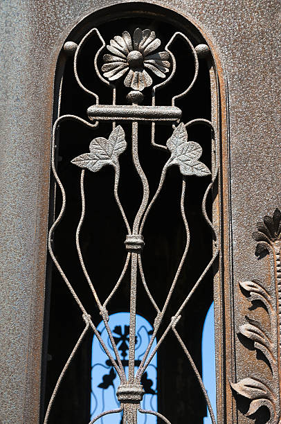 istock Iron Art grille in old chapel at  Russian  cemetery 500492707