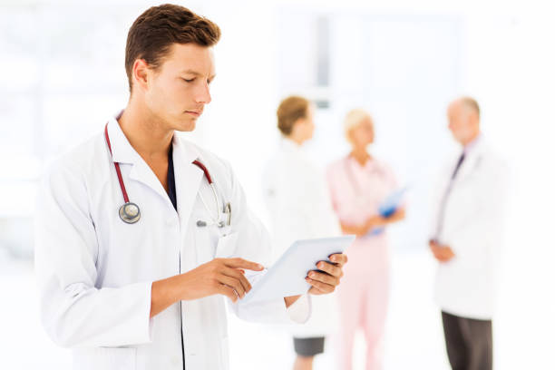 istock Young Male Doctor Using Digital Tablet In Hospital 500493399