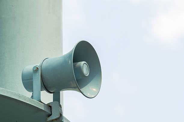 istock Metal loudspeakers on building for information. 500493902