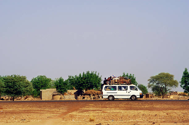 Africa Burkina Faso Ouagadougou View Of Overloaded African Car Carrying  Luggage On Roof High-Res Stock Photo - Getty Images