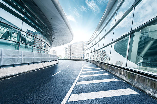 istock skyline and road by buildings 500504022