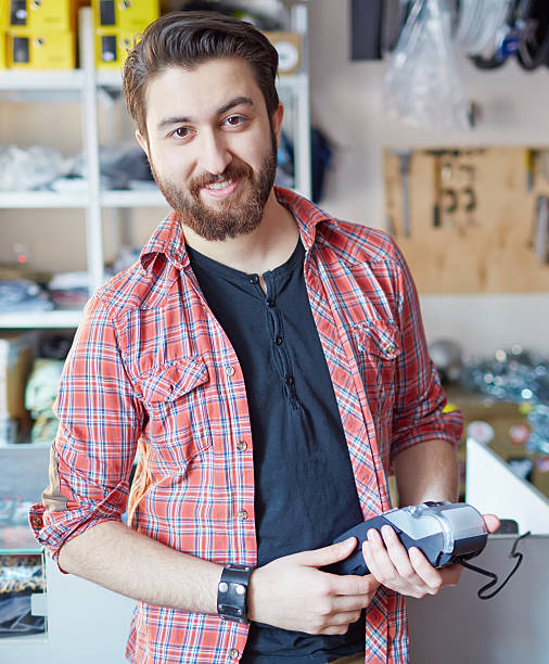 istock Man at the cash register 500504499