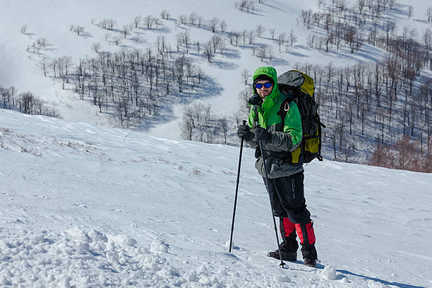 istock Hiker in winter mountains on sunny day 500505330