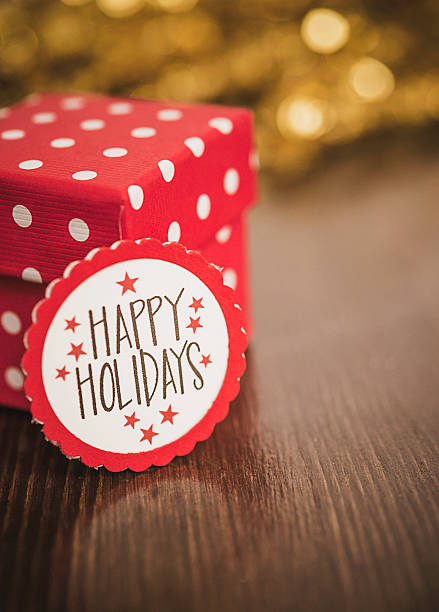 istock Polka dot Christmas gift with Happy Holidays message 500506018