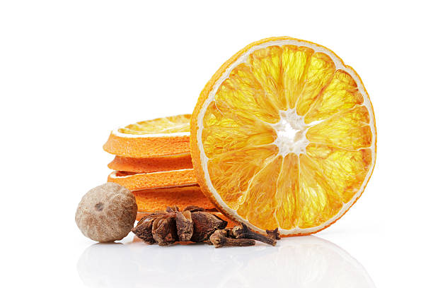 istock Dried orange with spices on a white background 500508494
