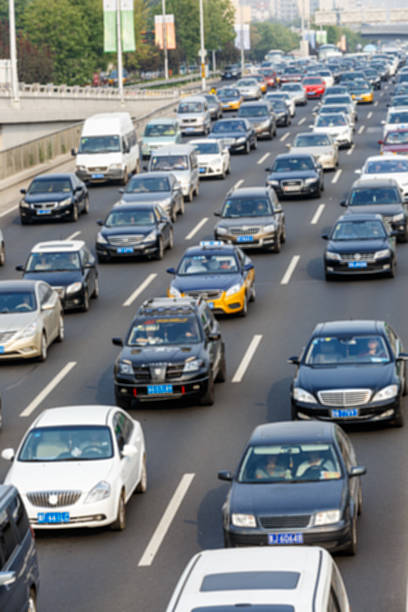 istock urban traffic jam in the rush hour，Fuzzy automotive background 500509298