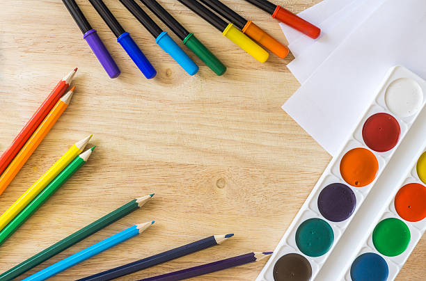 istock Colored felt-tip pens, pencils, white paper and watercolor 500509570