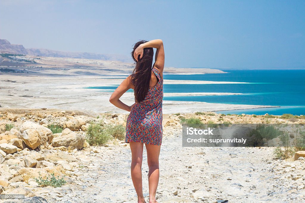 Girl at the Dead Sea Young woman going to Dead Sea, Israel Adult Stock Photo
