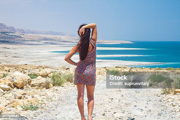 Girl At The Dead Sea Stock Photo - Download Image Now - Adult, Animal, Animal Back