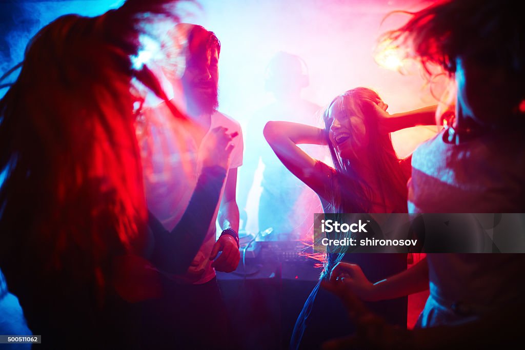 People dancing Young people dancing in nightclub Dancing Stock Photo