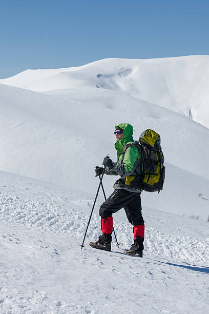 istock Hiker in winter mountains on sunny day 500511878