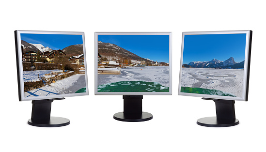 Mountains ski resort St. Wolfgang Austria panorama in computer screens - isolated on white background