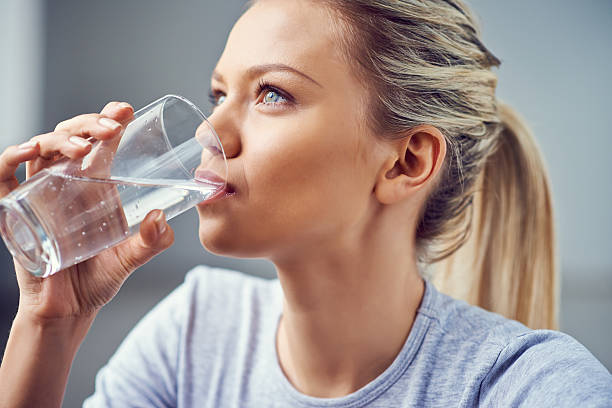 Drinking water before meal stock photo