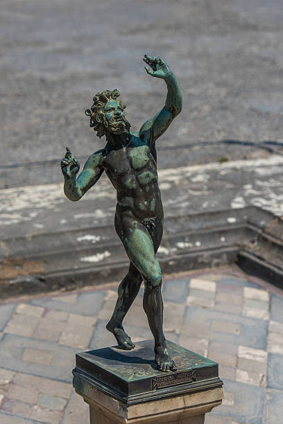 Bronze statue in House of the Faun, Pompeii, Italy Bronze statue in House of the Faun, Pompeii, Italy bronze statue stock pictures, royalty-free photos & images