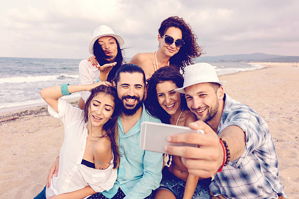 istock Group of friends taking a selfie at the beach 500515144