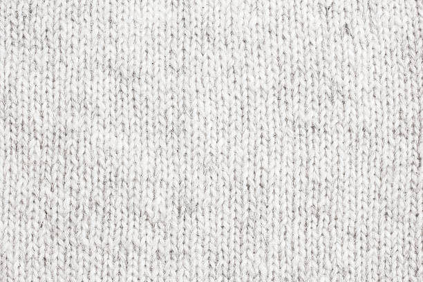 White Knitted Wool - Close Up White Knitted Wool - Close Up crochet photos stock pictures, royalty-free photos & images