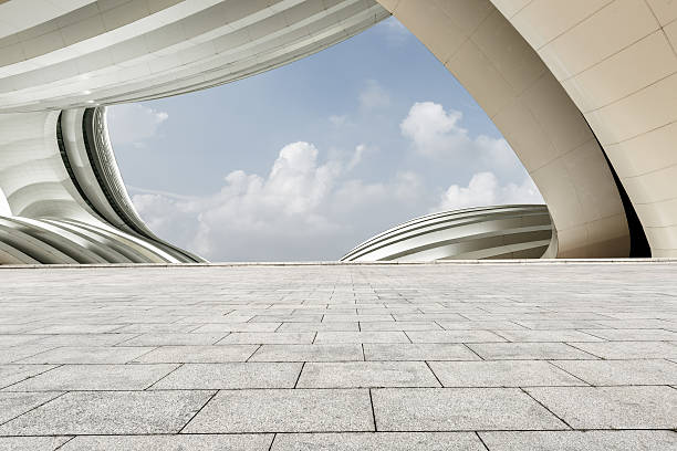 istock square floor road in front of the Modern urban architecture 500515972