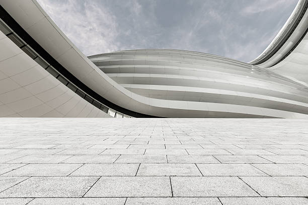 square floor road in front of the Modern urban architecture