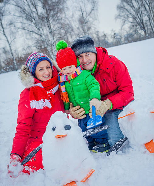 istock Family playing snow 500516616