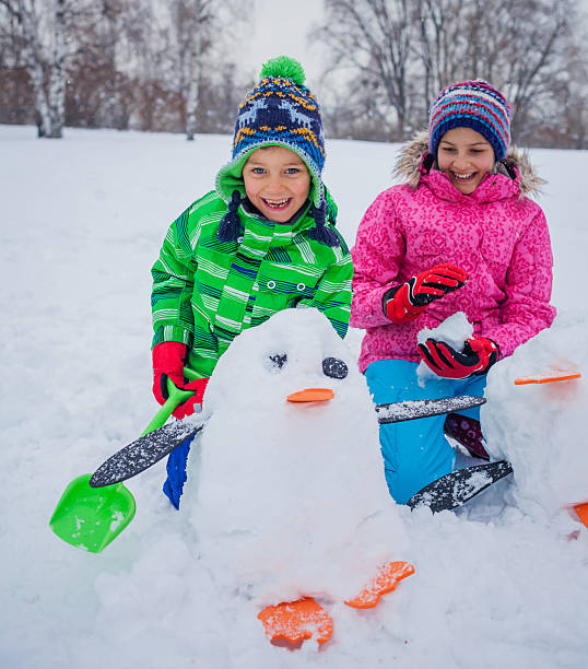 istock Kids plaing in the snow 500516638