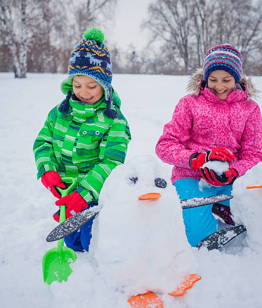 istock Kids plaing in the snow 500516680