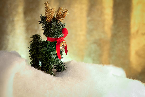 istock xmas deer with golden glitter background 500517710