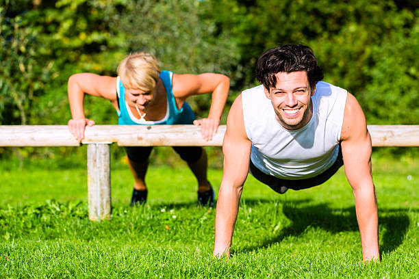 istock Fitness people doing pushups for sport 500520495