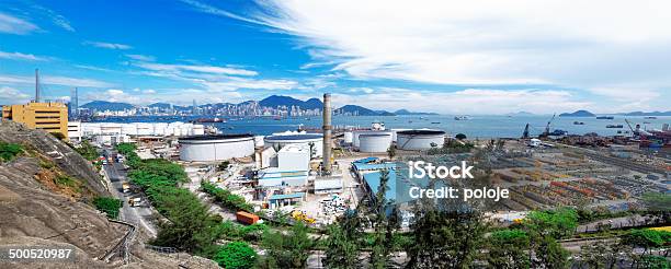 Oil Storage Tanks With Urban Background Stock Photo - Download Image Now - Architecture, Built Structure, Business Finance and Industry
