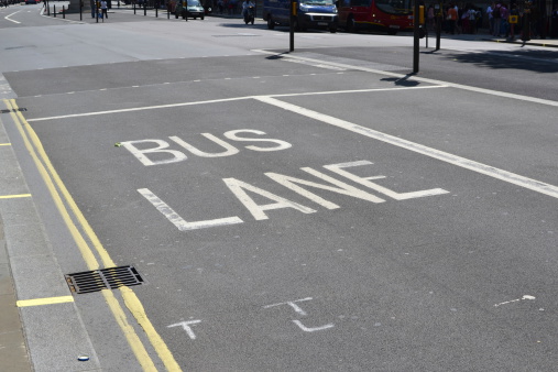 A bus lane  road marking