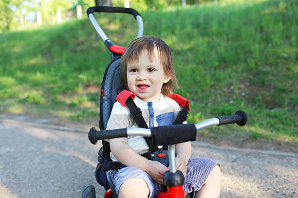 istock happy 20 months baby on bike 500521781