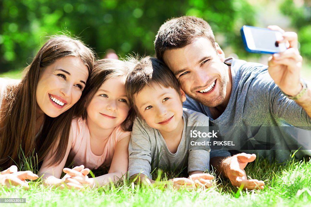 Family taking picture of themselves Adult Stock Photo
