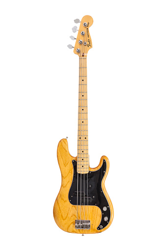 Los Angeles, California, USA - June 19, 2014:  Illustrative editorial photo of vintage Fender Precision electric bass guitar on white background.