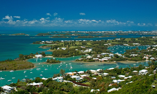 A high level view of Bermuda's Great Sound, with a deep blue sky and aqua ocean