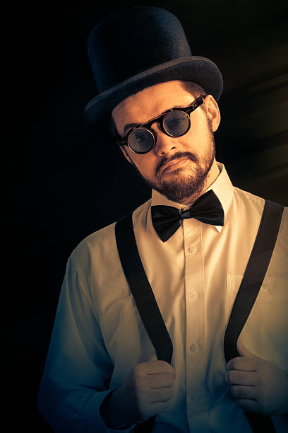 istock Man with Top Hat and Steampunk Glasses Retro Portrait 500525313