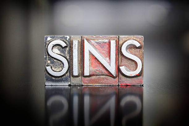 Sins Letterpress The word SINS written in vintage letterpress lead type hell photos stock pictures, royalty-free photos & images