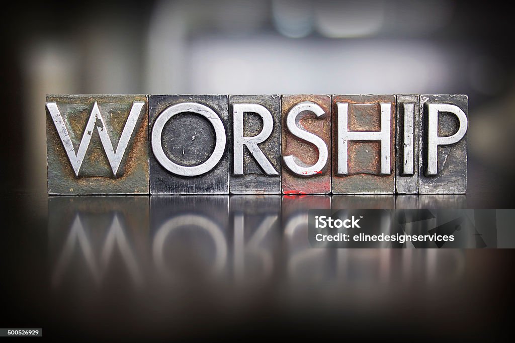 Worship Letterpress The word WORSHIP written in vintage letterpress lead type Bible Stock Photo