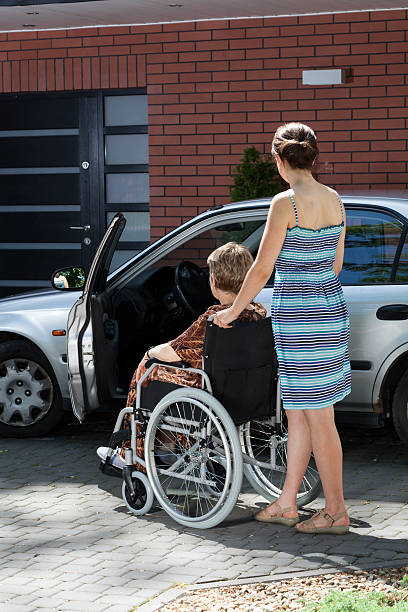 istock Lady on wheelchair before driving 500527017