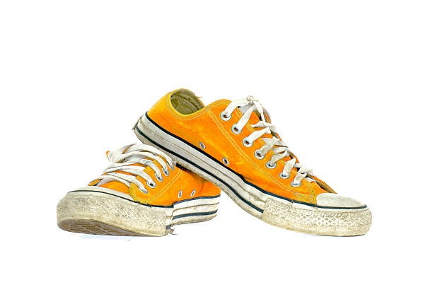 istock vintage yellow shoe on White  background 500527495