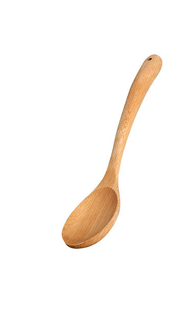 istock New wooden spoon isolated on a white background 500533884