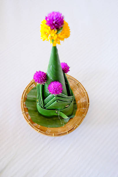 istock selective focus of decorative  banana leaf cone with flowers 500534888