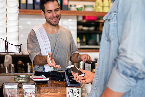istock Using the contactless mobile phone payment in the cafeteria 500536136