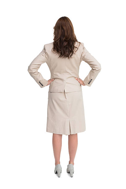istock Businesswoman standing back to camera 500536139