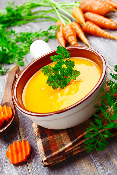 istock Carrots soup in the ceramic pot 500536700