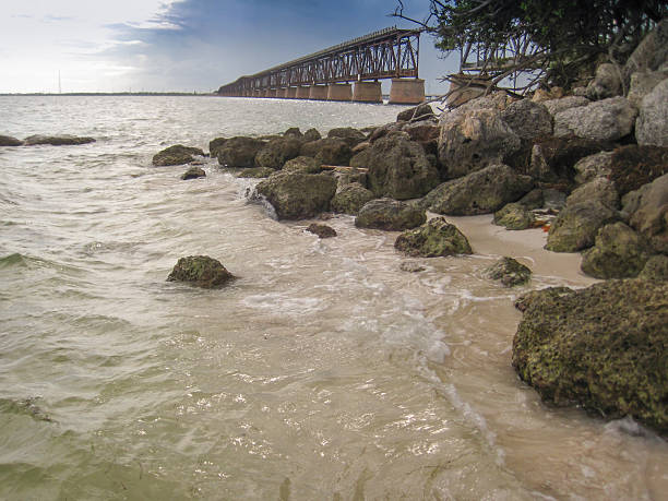 Bridge to Nowhere in Florida Keys Remnant of an old railway bridge rests unused in the Florida Keys tressle stock pictures, royalty-free photos & images