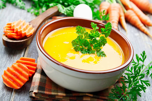 istock Carrots soup in the ceramic pot 500536930