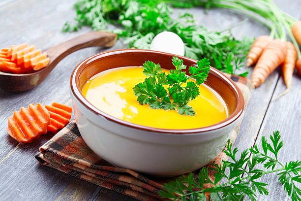 istock Carrots soup in the ceramic pot 500537020
