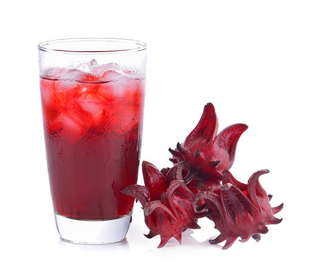 istock roselle flower juice in glass with ice isolated 500537228
