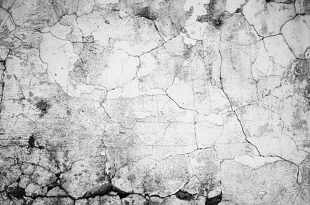 old gray wall texture background - gebarsten stockfoto's en -beelden