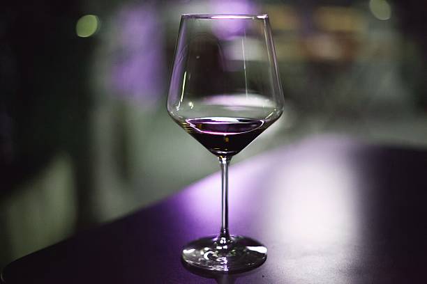 purple wine glass stock photo