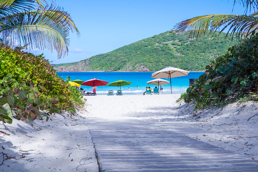 Wooden walkway leads to beautiful tropical sandy Flamenco Beach on the Puerto Rican island of Culebra